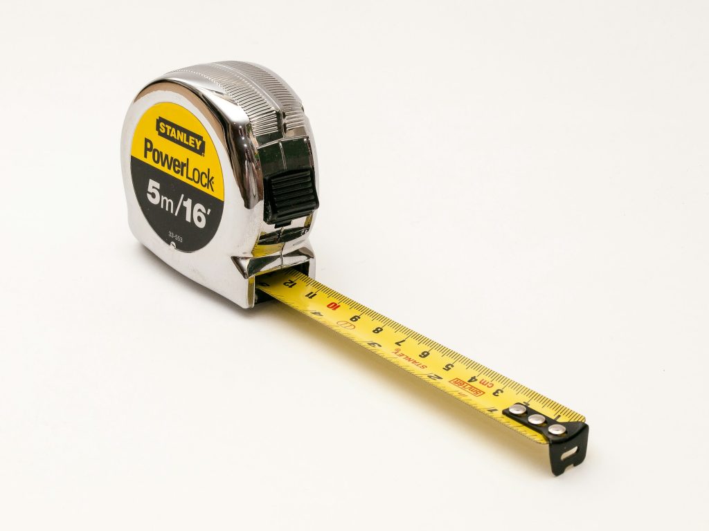 A tape measure on a white background.